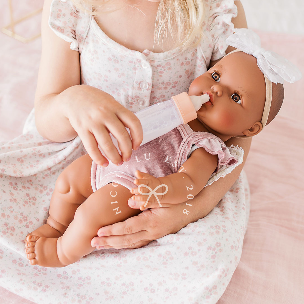 Mini Colettos Alba wearing the Rose Blush Flutter Velvet Singlet Romper.