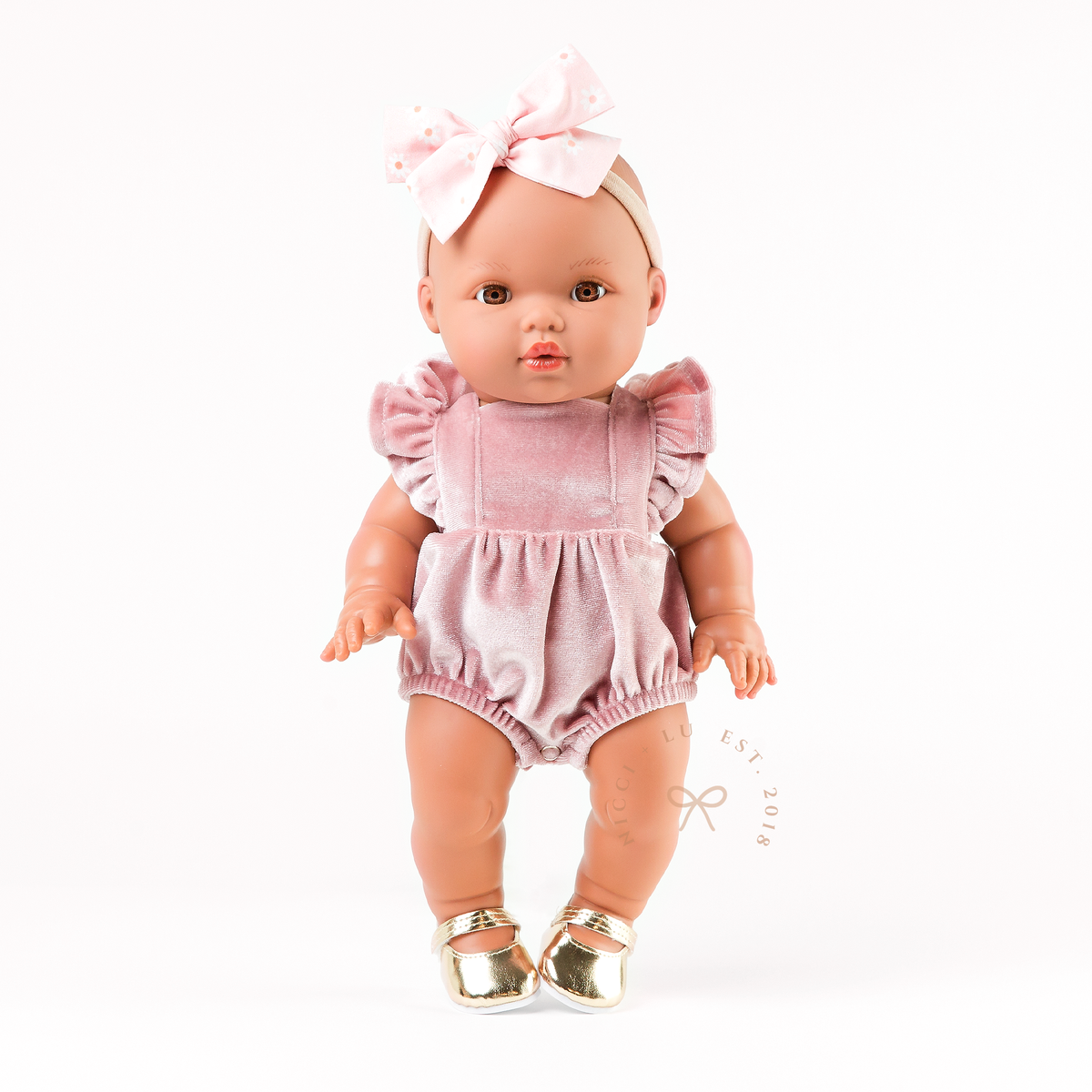 Mini Colettos Alba wearing the Rose Blush Velvet Frilled Bubble Playsuit with Gold Mary Jane Shoes for 34-38cm Dolls.