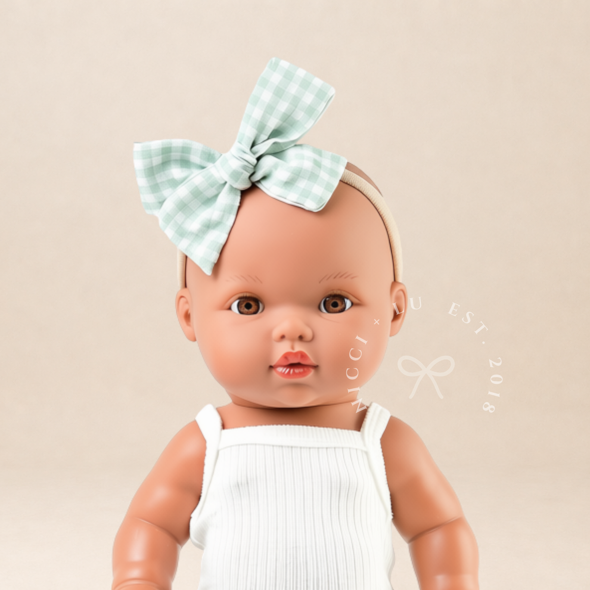 34cm Mini Colettos Alba doll in ivory singlet bodysuit with sage green gingham bow - Nicci and Lu Australian doll clothing boutique.