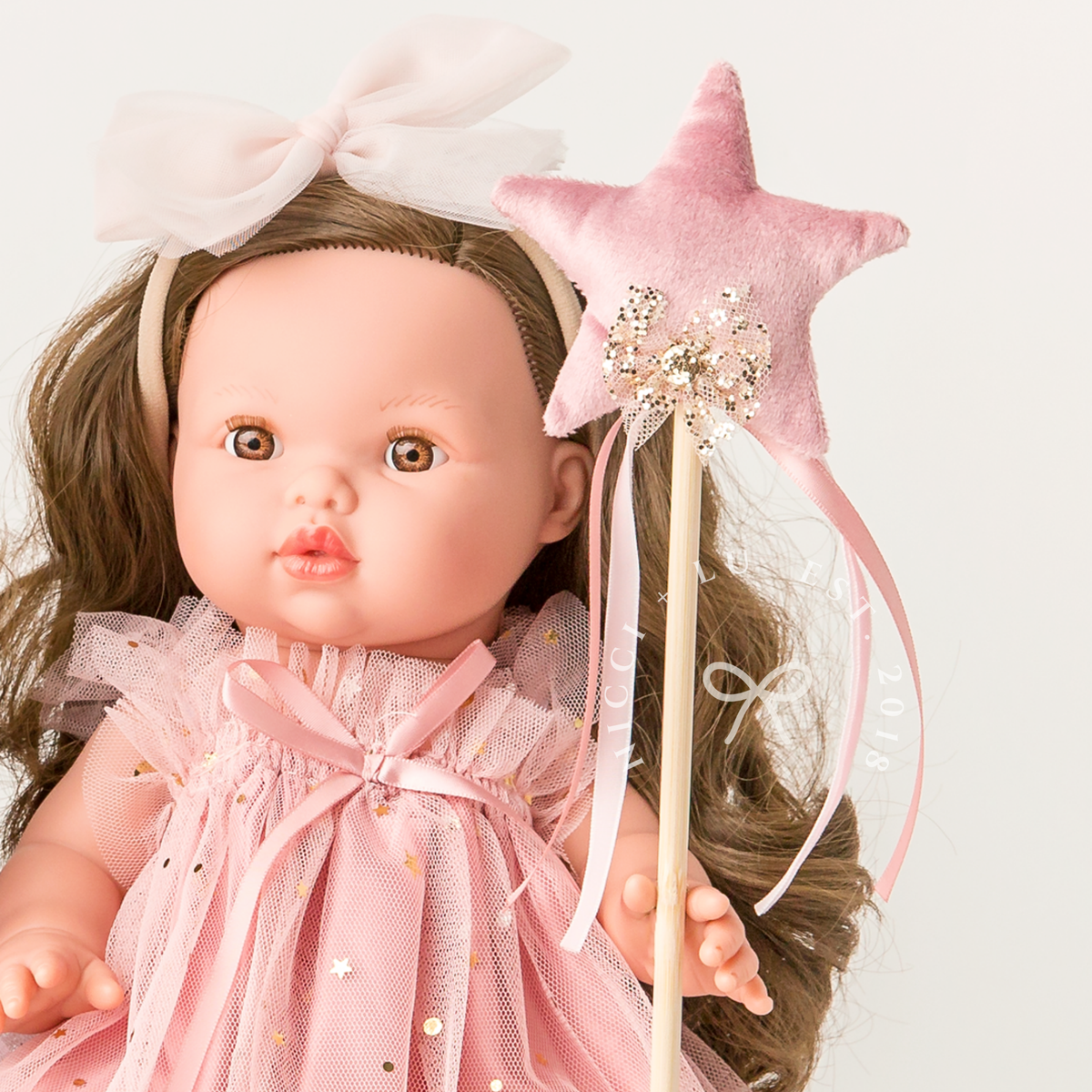Mini Colettos Alaska wearing the Rose Blush Tulle Ballet Dress with a Magical Fairy Wand and tulle headband.