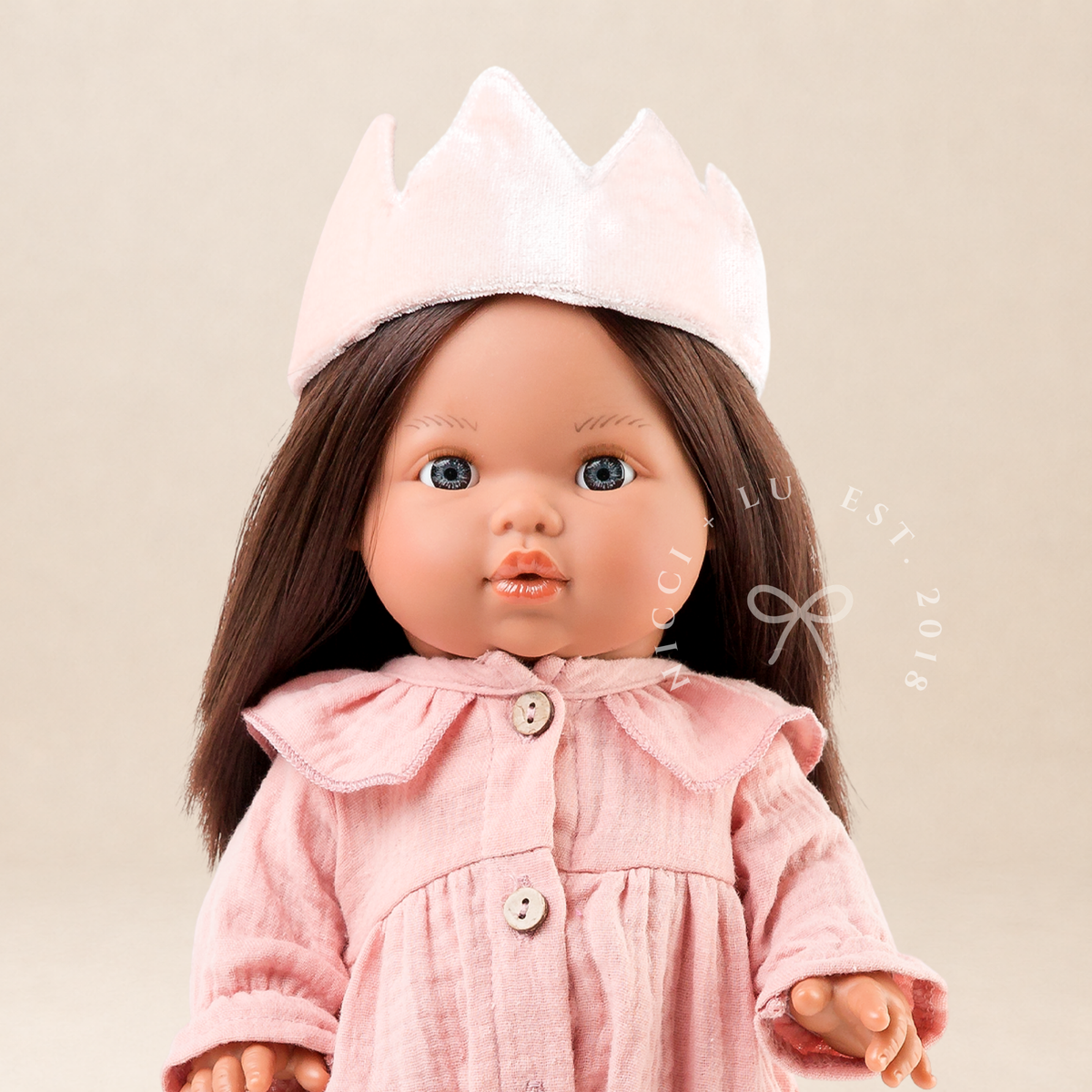 34cm Mini Colettos Isabel doll wearing Daisy Muslin Playsuit in Rose Blush with ballet pink velvet crown by Nicci and Lu.