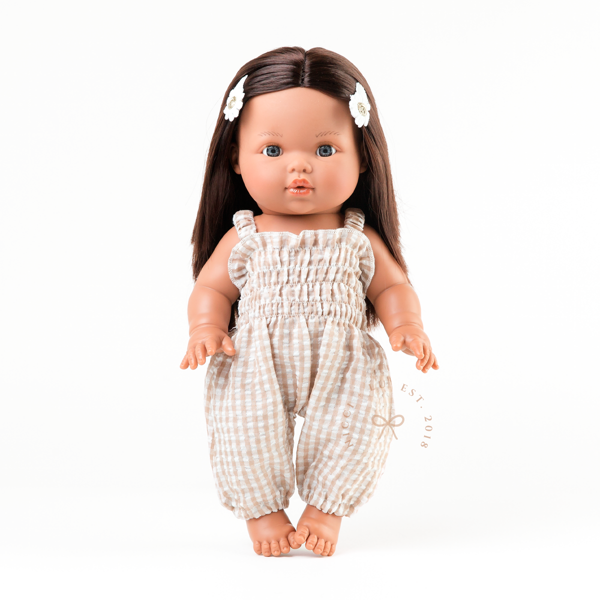 Mini Colettos Isabel wearing the Florence Smocked Jumpsuit in Beige Gingham.
