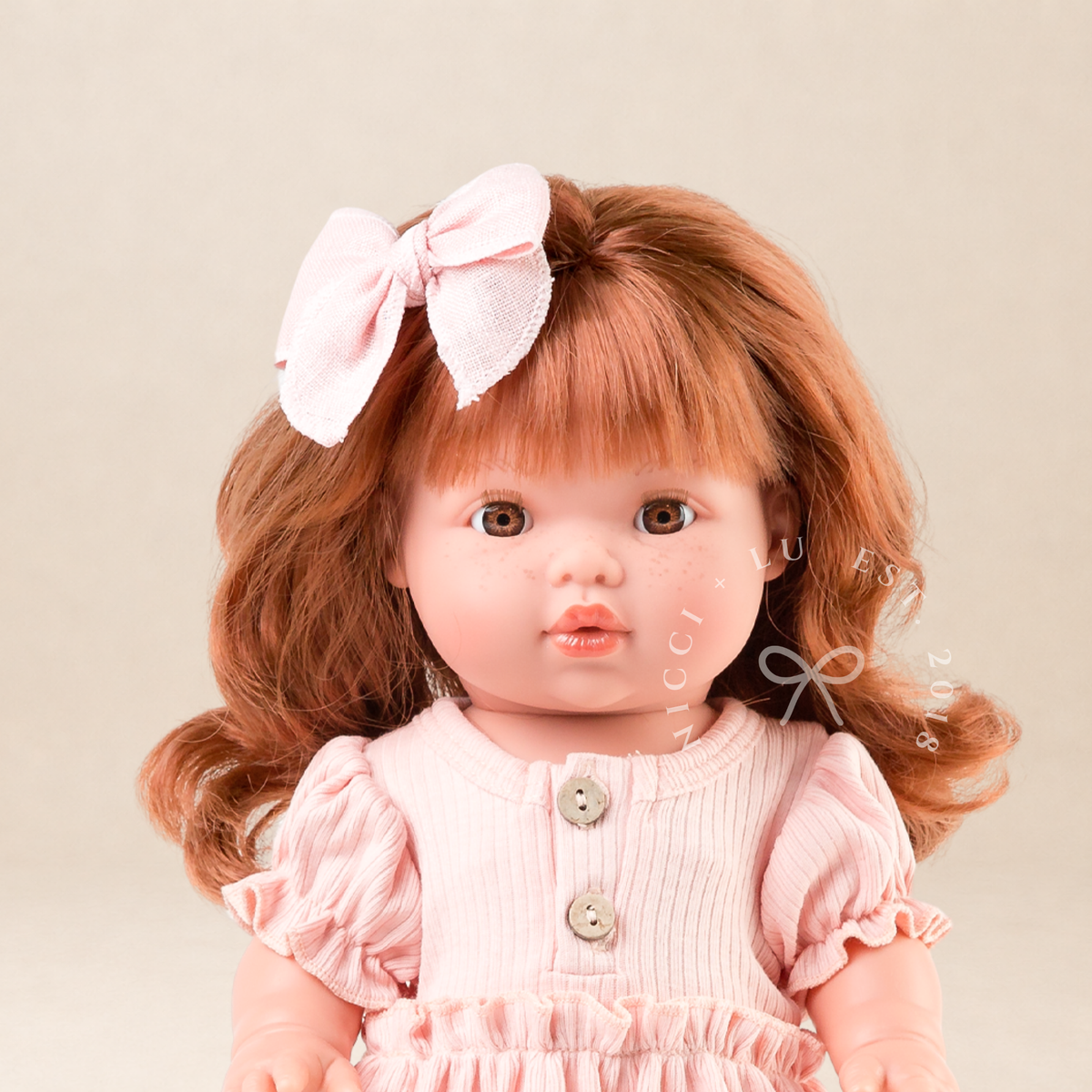 34cm Mini Colettos Sophia doll with red hair wearing a rose pink puff sleeve dress by Nicci and Lu, a Australian doll clothing boutique.
