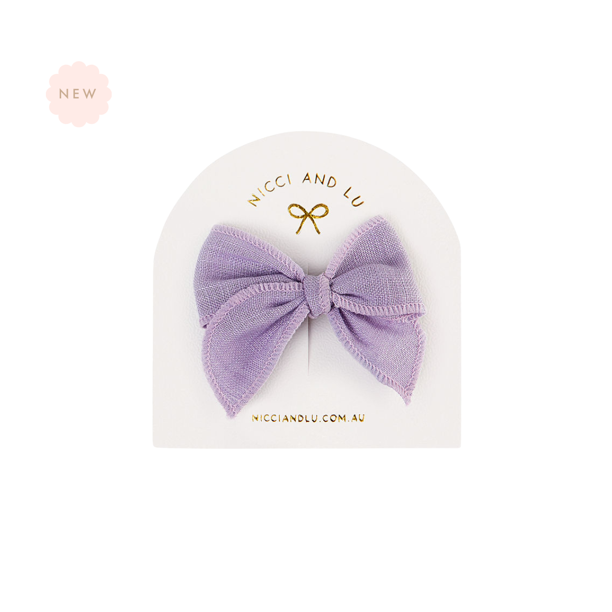 Nicci + Lu Fable Box Mauve hair bow  with 'Nicci and Lu' branding on a white background.