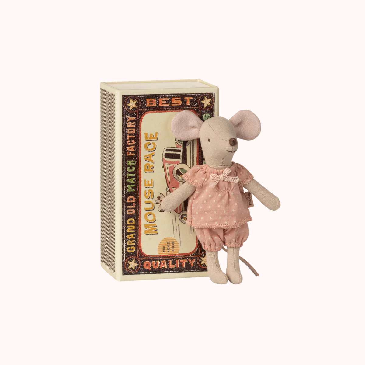 Maileg Big Sister  mouse toy in a pink polkador outfit standing on a matchbox with decorative text.