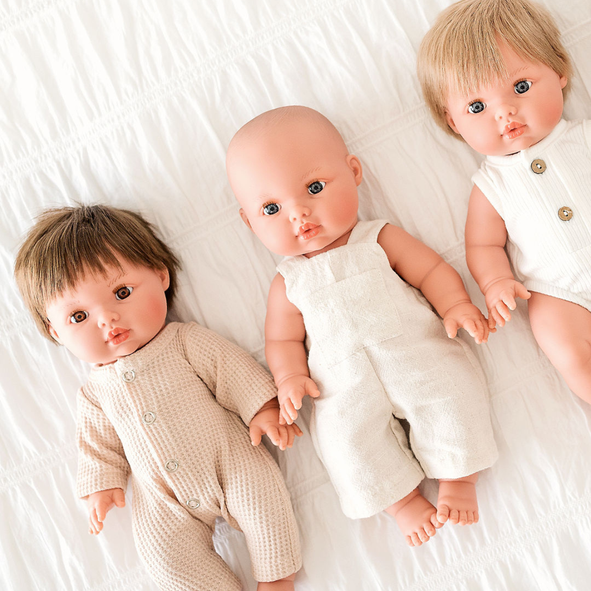 Mini Coletto Thomas 34cm doll wearing a Oat Line Doll outfit on a white background 