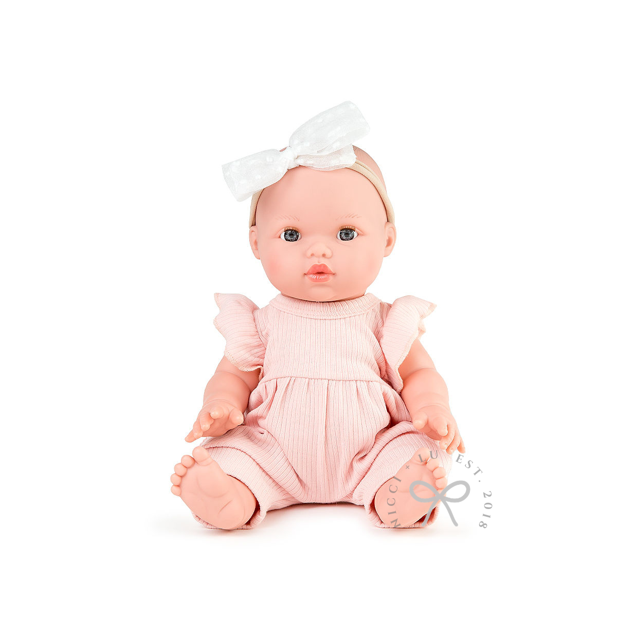 nicci and lu Mila mini coletto doll wearing a ribbed jumpsuit in rose pink 34cm doll clothing