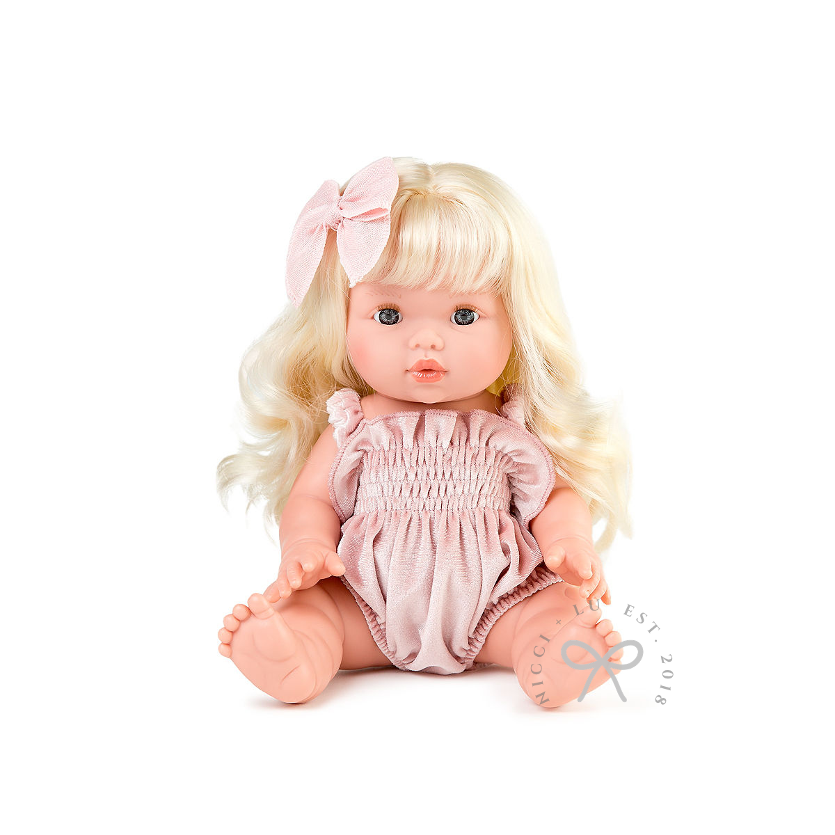 nicci and lu mini coletto doll sage wearing a smocked bubble romper in rose blush velvet 34cm doll clothing