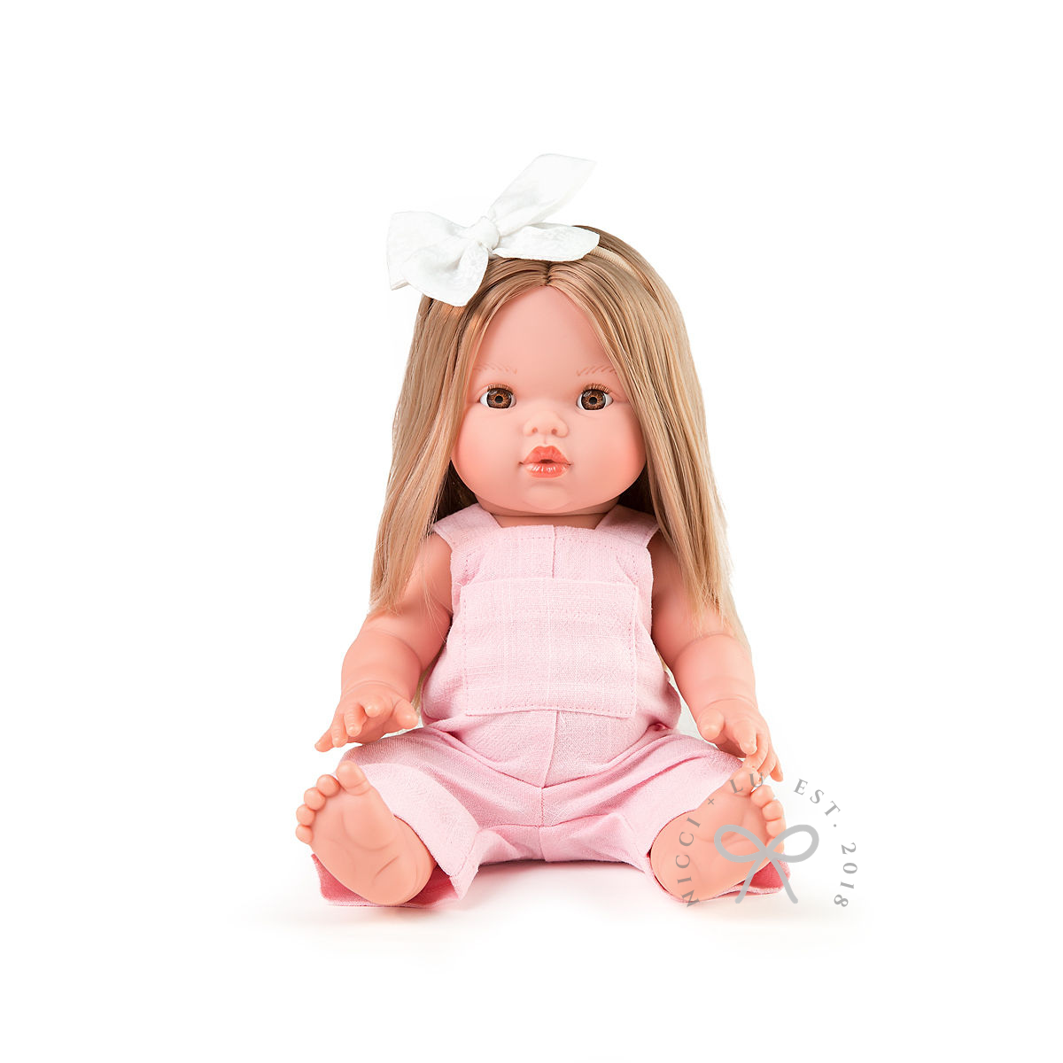 nicci and lu mini coletto sandra wearing a pink overall and white velvet bow clip 34cm doll clothing