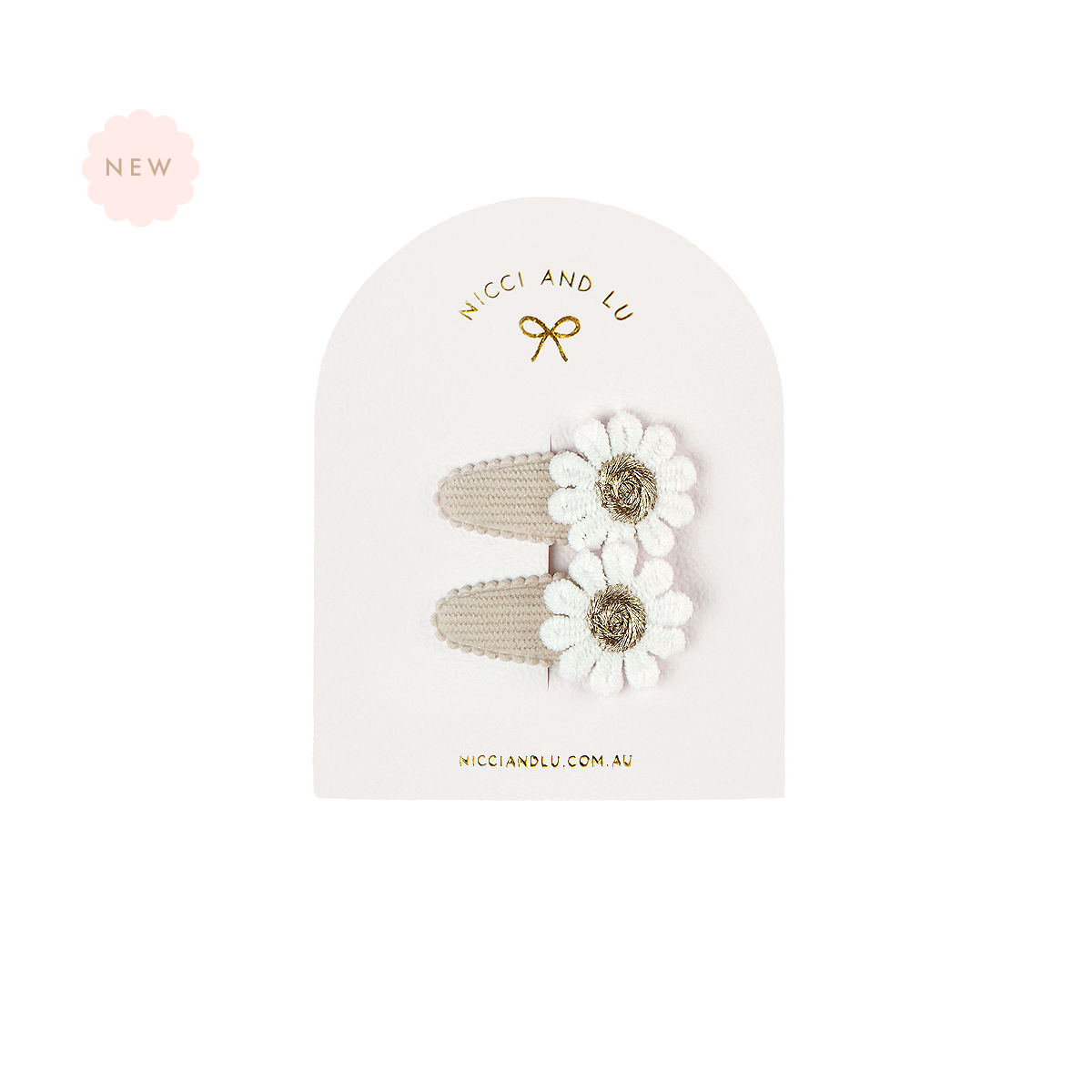 Nicci + Lu Mini Daisy Snap Clips Oatmeal Corduroy Packaged hair accessories with a daisy detail on a white background