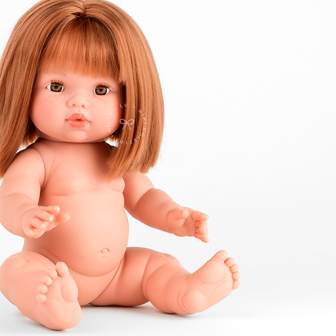 This seated close-up of Sadie showcases her distinctive strawberry-blonde bob hairstyle, softly sculpted facial features and anatomically correct doll body. The 34cm Mini Colettos doll is perfect for pretend play and creating imaginative stories.