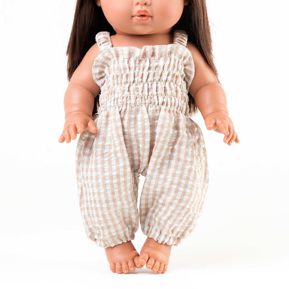 Front view of the Florence Smocked Jumpsuit in Beige Gingham on Mini Colettos Isabel.
