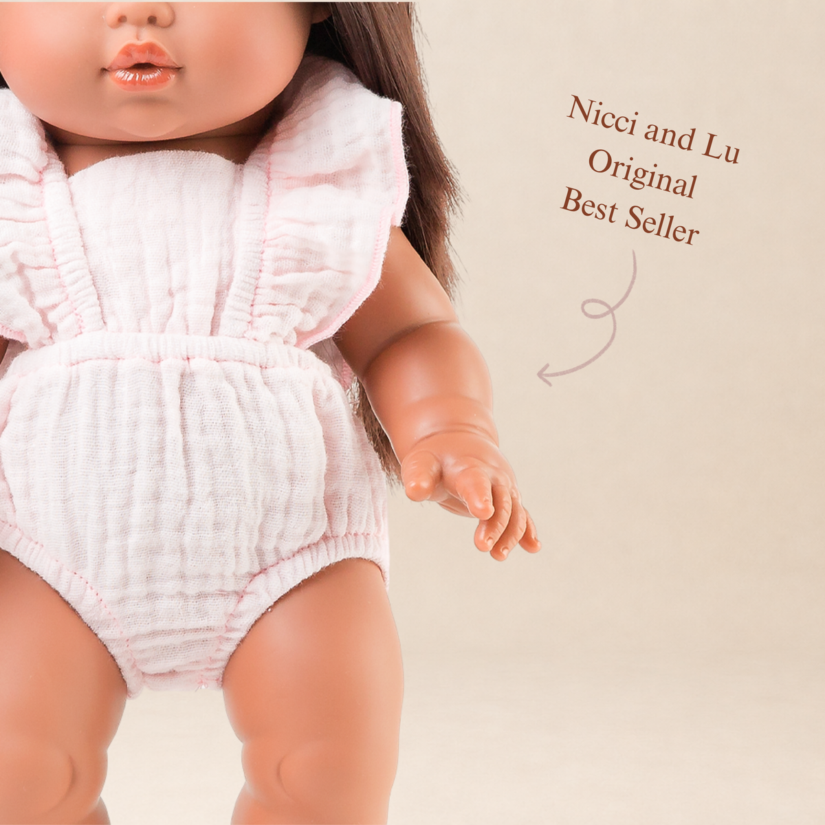 Close-up of the Flutter Romper in Cotton Candy highlighting the flutter sleeves and gathered bodice for 34-38cm dolls.