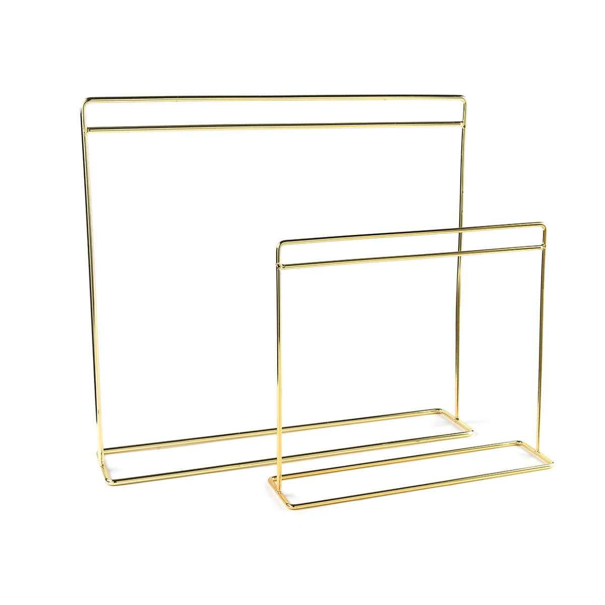Gold metal clothing rail for doll clothing rack on a white background