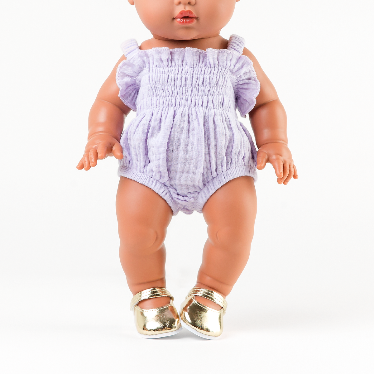Front view of the Olivia Smocked Bubble Romper in Mauve Muslin on Mini Colettos Alba doll.