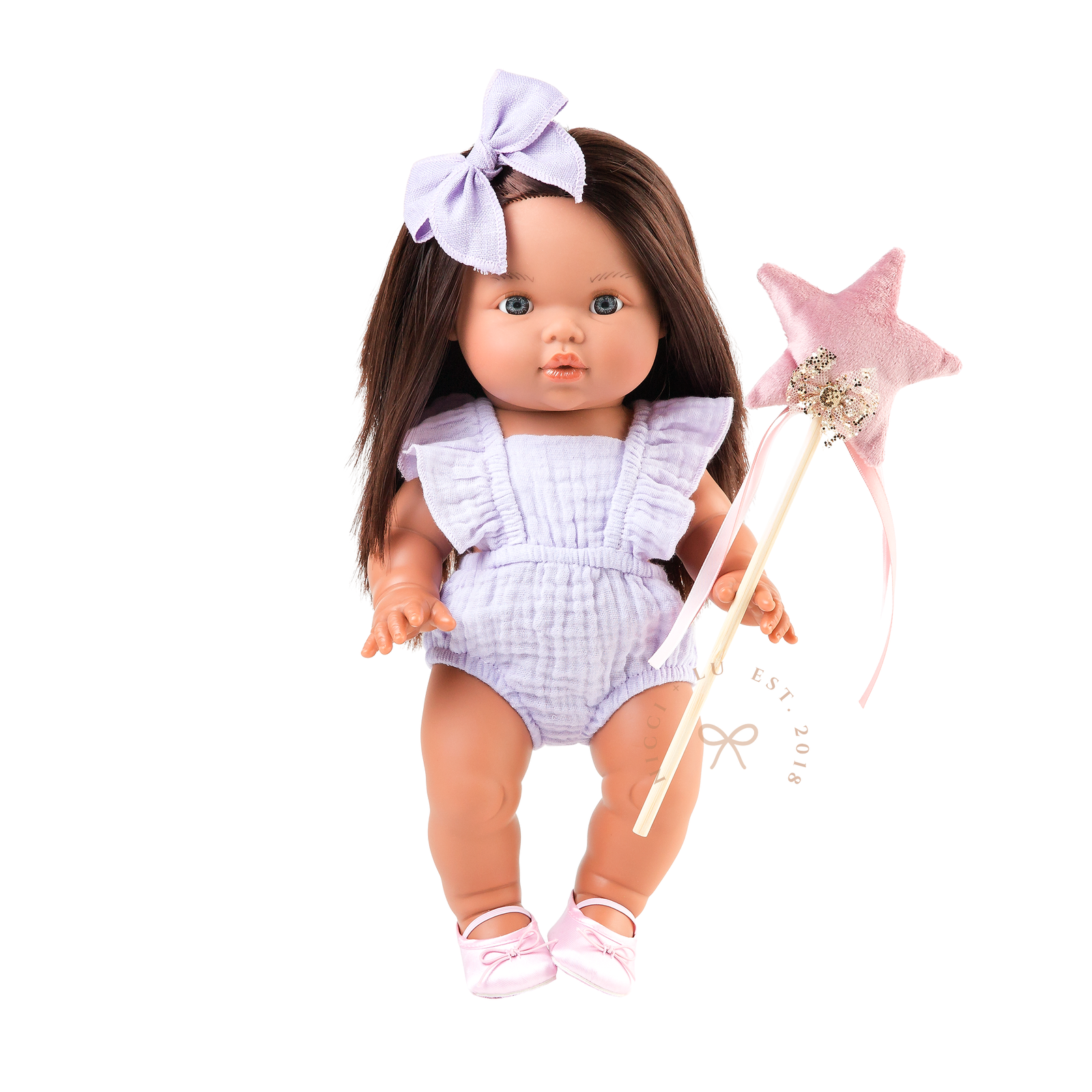 34cm Mini Colettos Isabel wearing the Flutter Romper in Mauve, holding a fairy wand and wearing satin pink ballet flats.