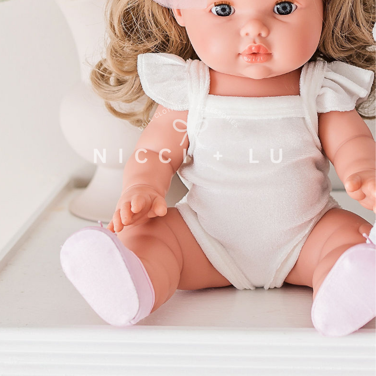 velvet flutter singlet ivory doll clothing on a white background
