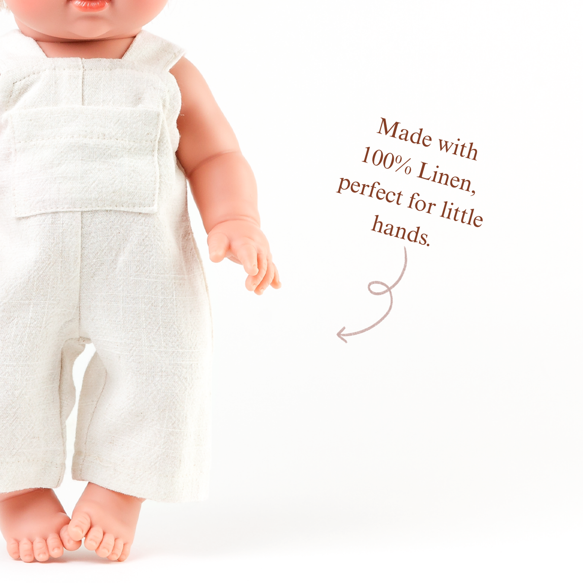 Close-up of the Oat Linen Romper showing the soft fabric and simple design.
