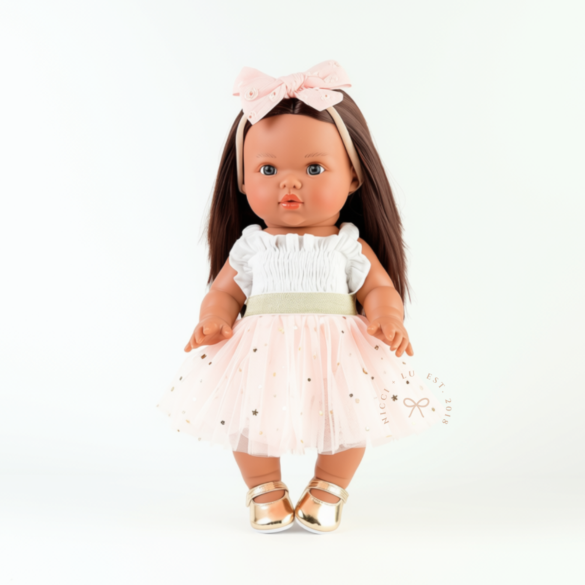 34cm Mini Colettos doll Isabel wearing the Rose Blush Doll Tulle Tutu with a white singlet bodysuit.