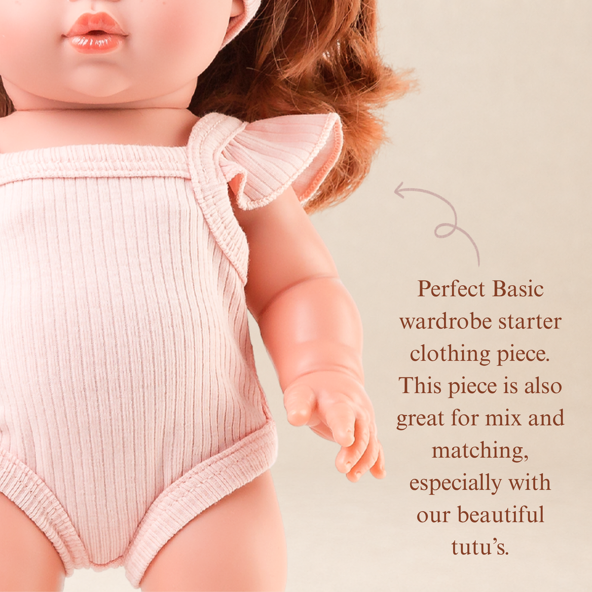 Close-up of the Rose Pink Flutter Singlet Romper showing the delicate flutter sleeves and soft fabric.