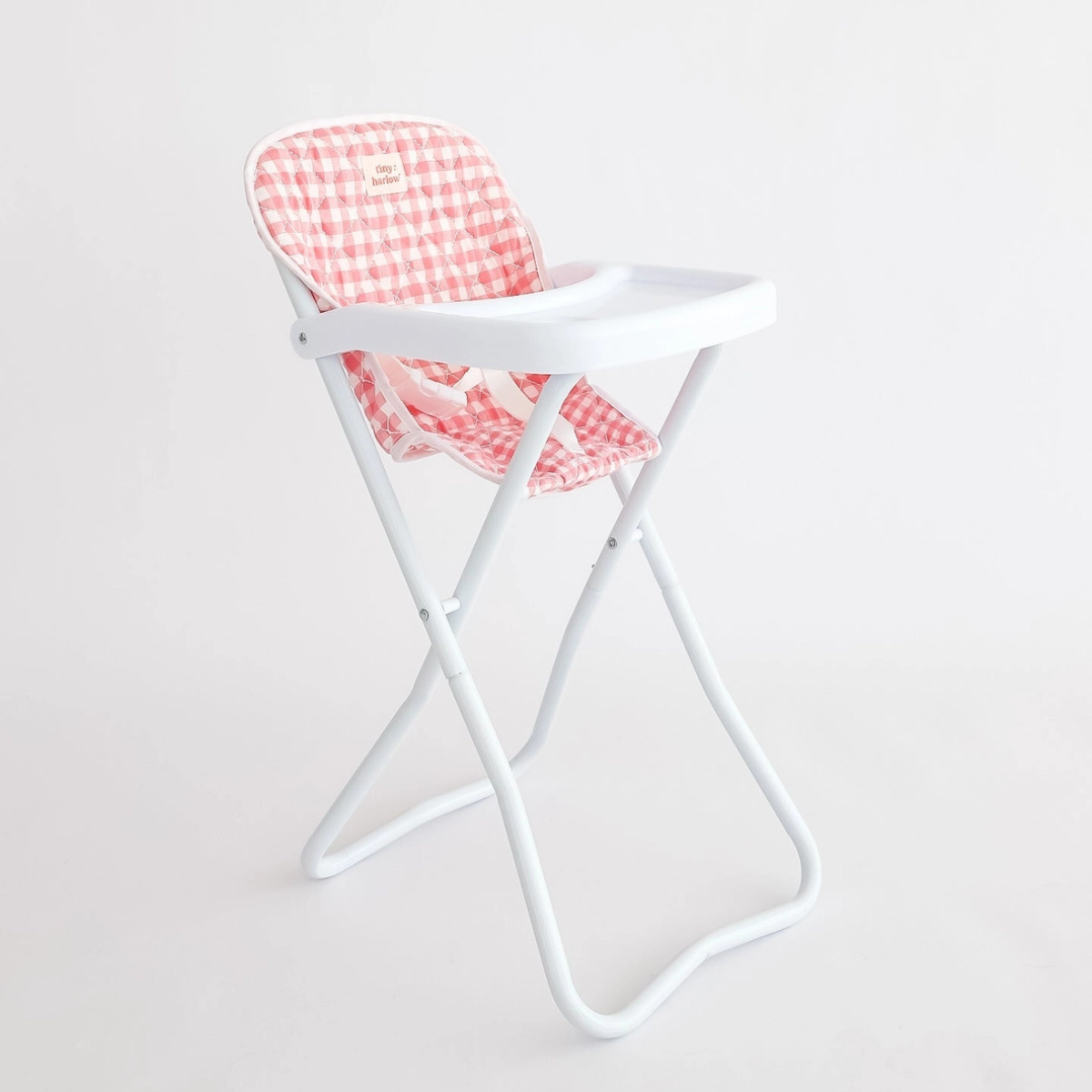 Tiny Harlow pink gingham doll highchair shown from the front