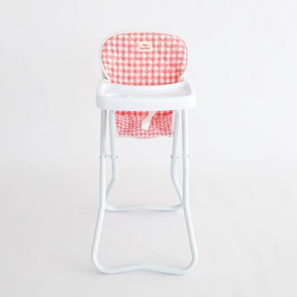 Tiny Harlow pink gingham doll Highchair shown against a white background.