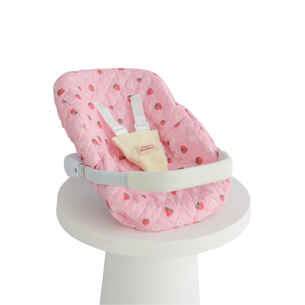 Tiny Harlow Strawberry Picnic doll car seat capsule with padded seat and harness